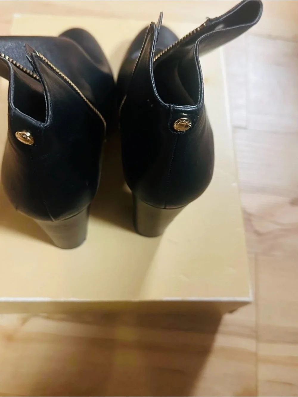 Michael Kors Sammy Platform Black Leather Ankle Booties with Gold Zipper.
